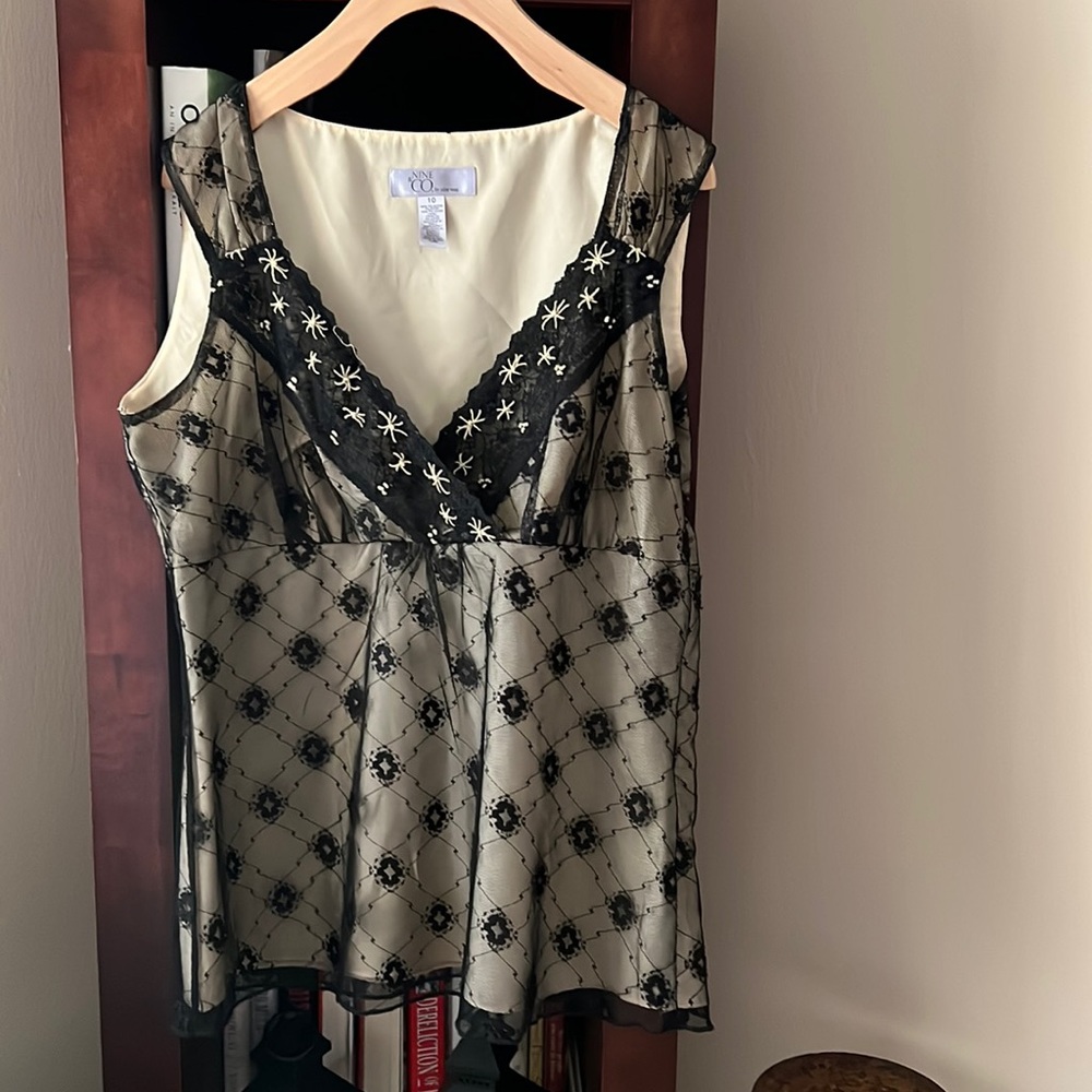 Black lace and ivory v-neck top